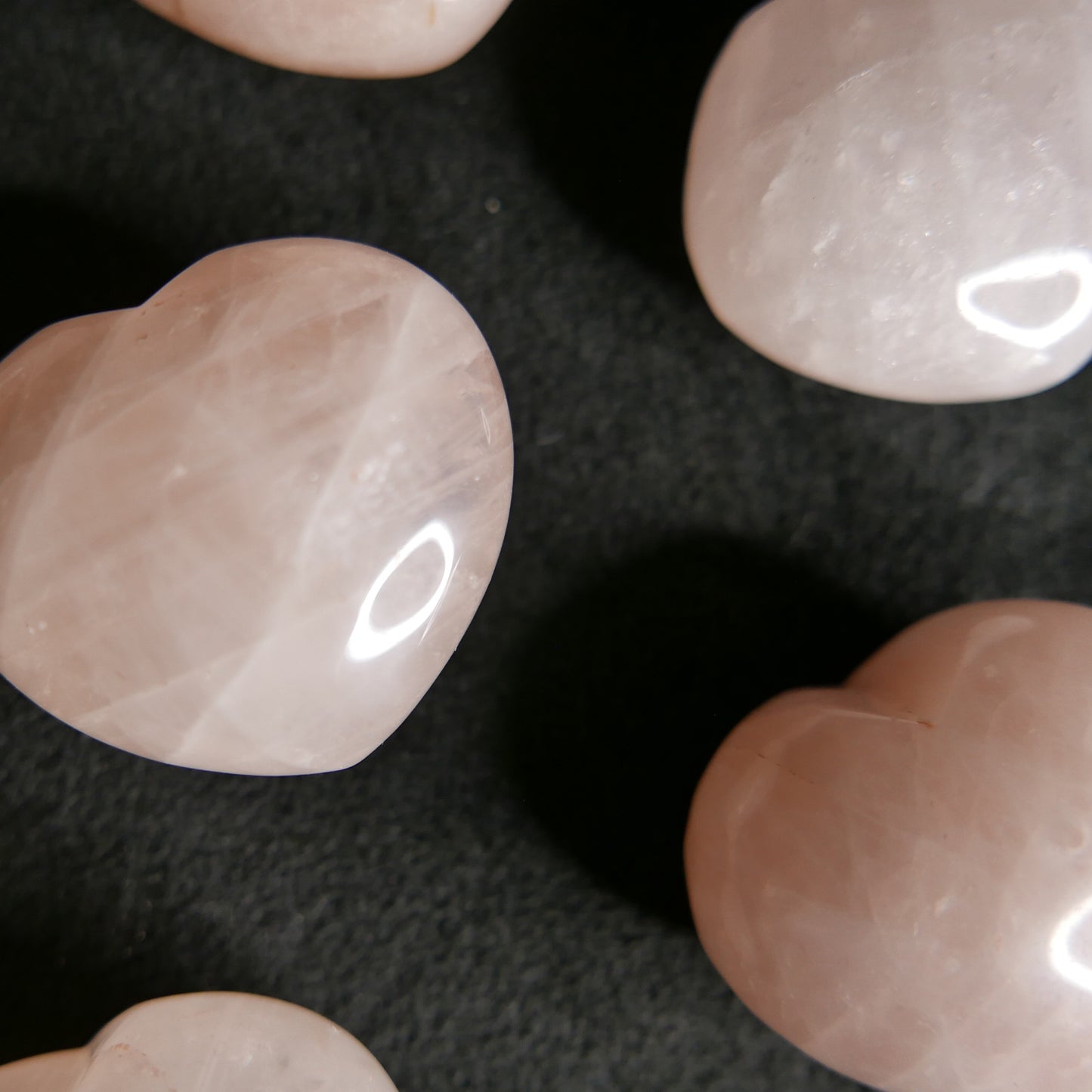 small rose quartz heart carving