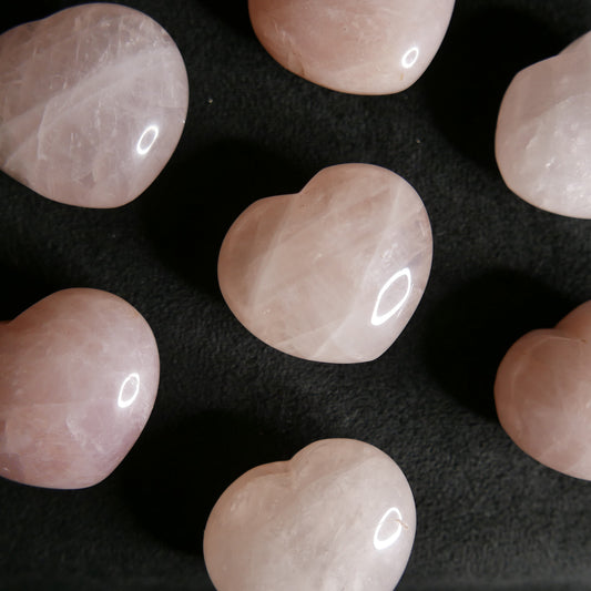 small rose quartz heart carving